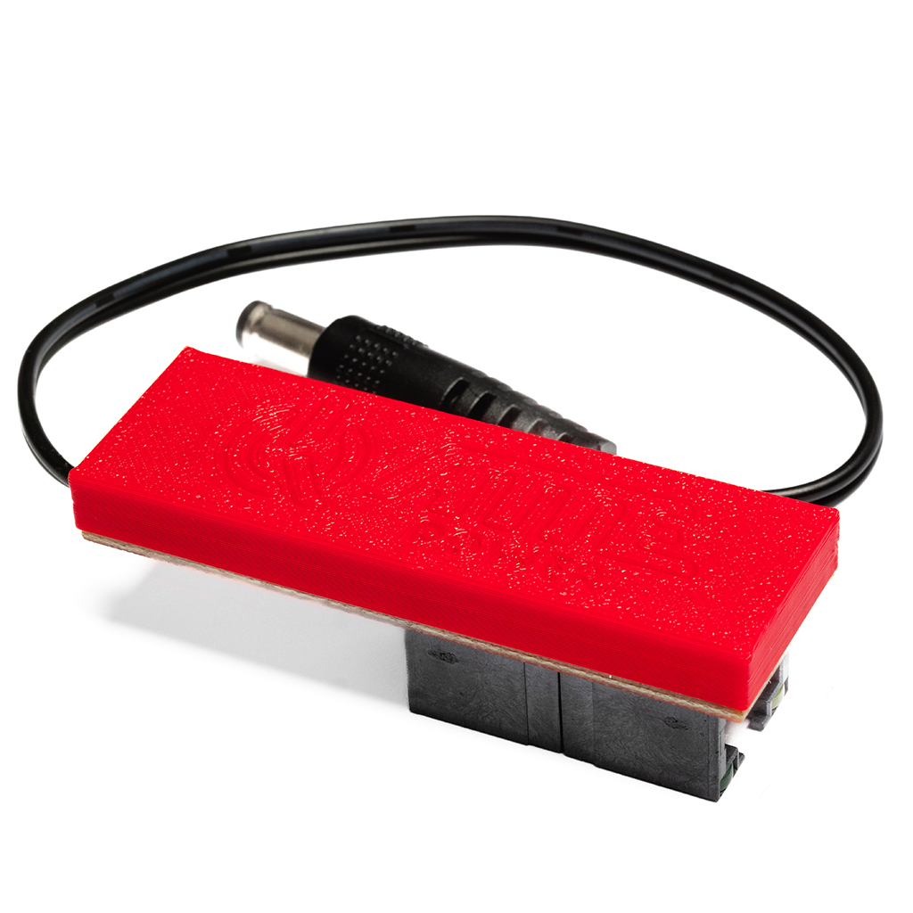 Gigabit PoE adapter reducing voltage to 12V